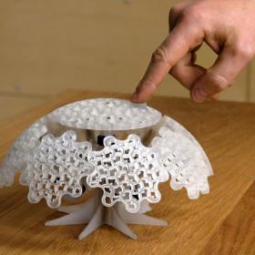 Tiny Planet: A 3D Printed Mechanical Sculpture